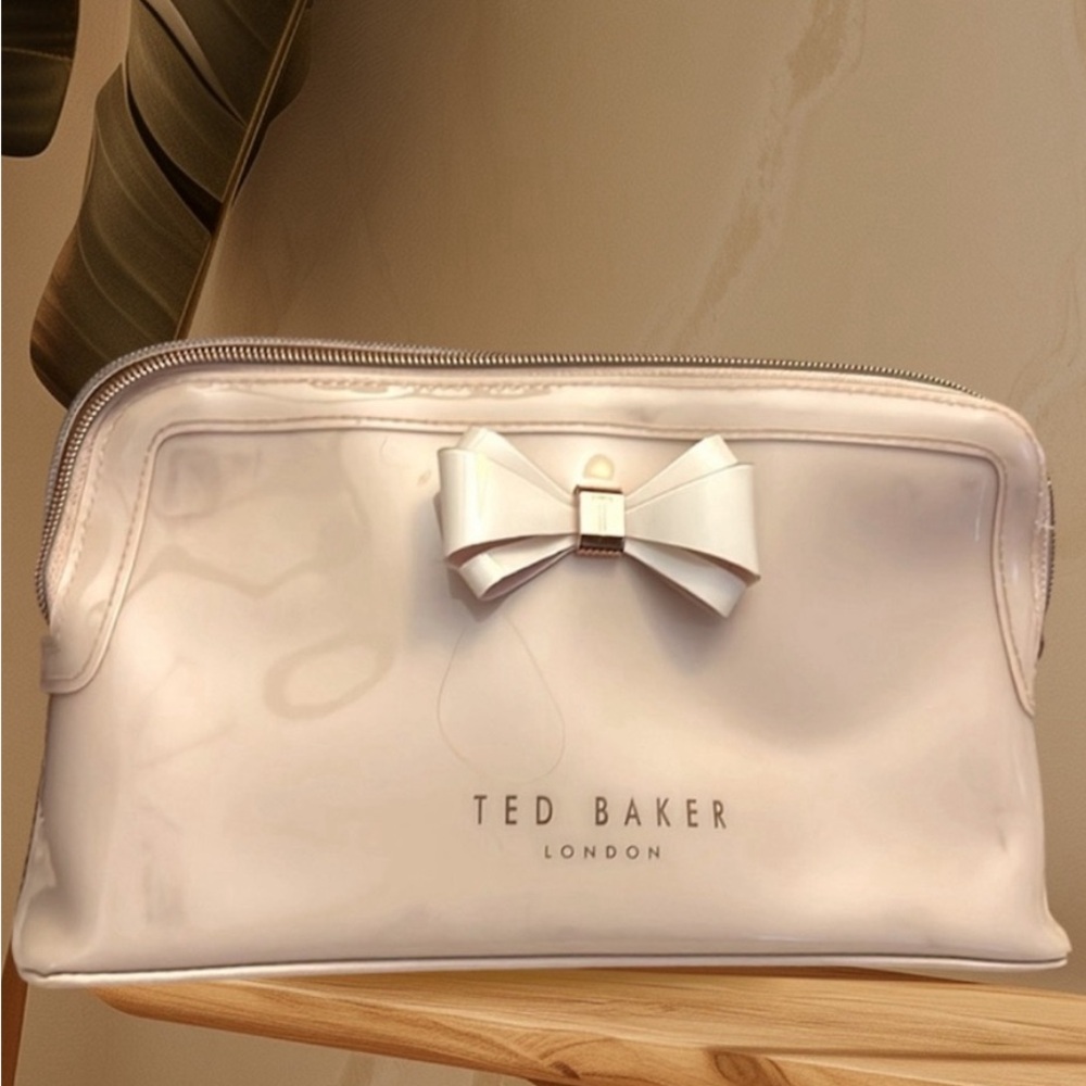 TED BAKER TAUPE PATENT BOW MAKEUP BAG